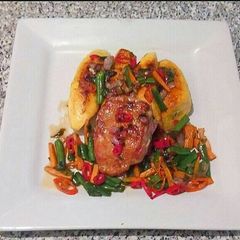 A picture of Bole and chicken veggies stir fry.