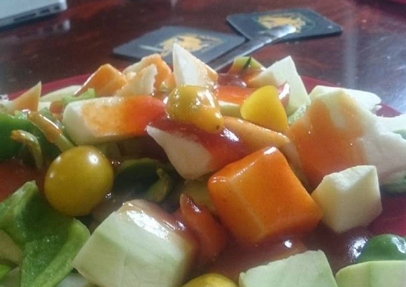 Zucchini salad with yellow pepper and cherry tomatoes