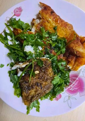 A picture of Grilled whitefish and cilantro salad.