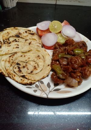 A picture of Chilli Mushroom with Laccha Paratha.
