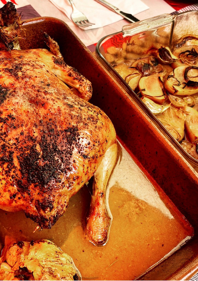 Una foto de Pollo asado con cítricos