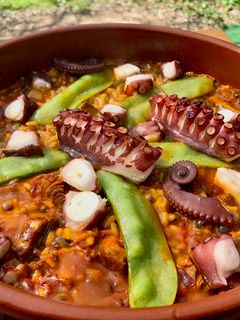 Una foto de Arroz Meloso de Pulpo con Alcachofas paso a paso