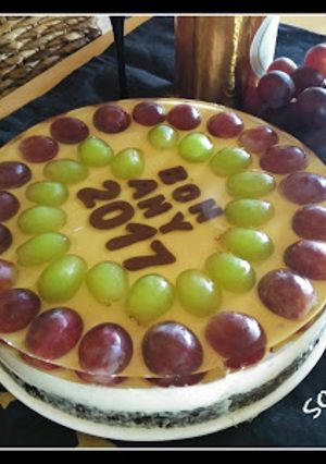 Una foto de Tarta de queso y uvas