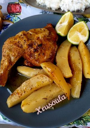 A picture of Juicy Lemon Chicken in the Oven.