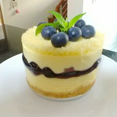 A picture of 5-Layered blueberry cheesecake.