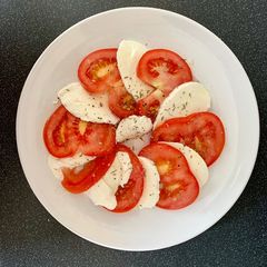 Tomato and mozzarella salad A picture of Tomato and mozzarella salad.