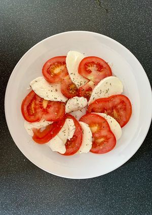 A picture of Tomato and mozzarella salad.