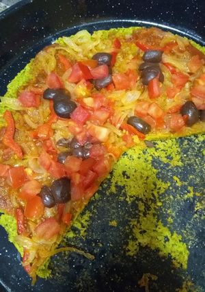 Una foto de Pizza con masa de brócoli y avena