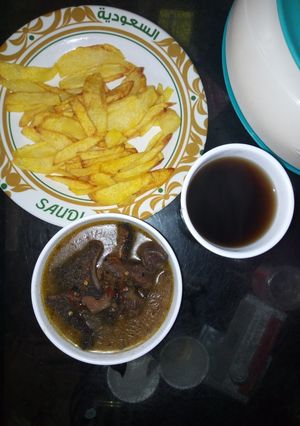 A picture of Chips and ferfesuf with black tea.