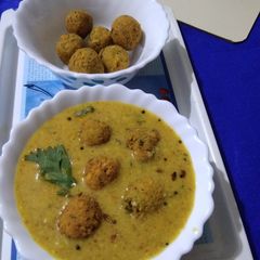 Coconut Kadhi with chana dal dumplings A picture of Coconut Kadhi with chana dal dumplings.