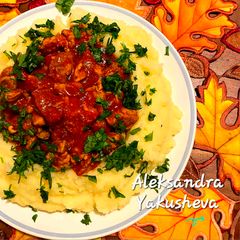 A picture of Pork with tomato sauce.