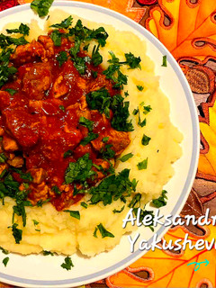 A picture of Pork with tomato sauce.
