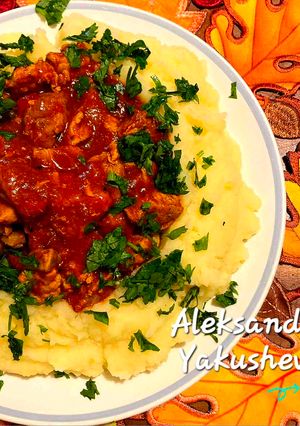 A picture of Pork with tomato sauce.