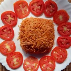 A picture of Tomato vermicelli upma.