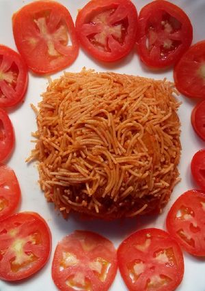 A picture of Tomato vermicelli upma.