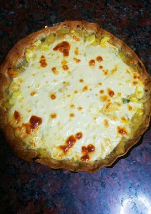 Una foto de Tarta de cebolla, queso y algo más!