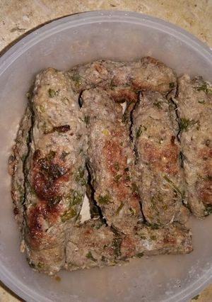 A picture of Grilled Kofta with Pomegranate Molasses.