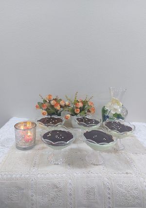 A picture of Pista custard pudding with almond chocolate pudding.