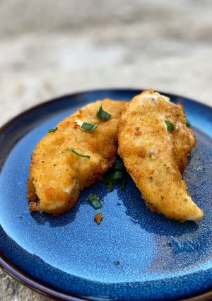 Una foto de Filetes de pollo empanado en freidora de aire