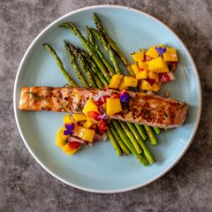 A picture of Glazed salmon with Thai style mango and strawberry salsa.