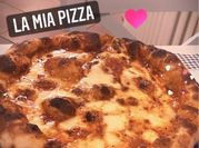 Una foto di pizza ai cereali