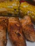 Garlic butter salmon with corn on the cob