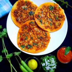 A picture of Madurai muttai kari dosa / Madurai egg keema dosa.