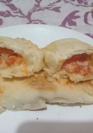 Una foto de Empanadas de tomate, ajo y queso