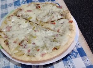 Una foto de Tarta de zapallitos zuchinis o de tronco
