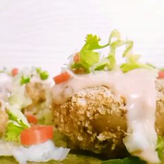 A picture of Cajun style smashed potato.