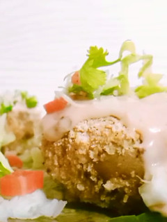 A picture of Cajun style smashed potato.