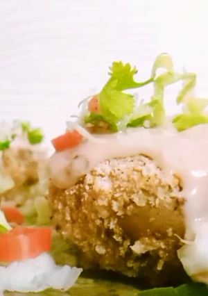 A picture of Cajun style smashed potato.