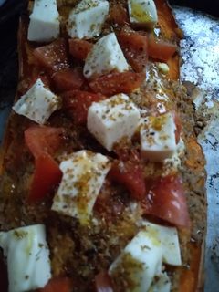 Una foto de Zapallo relleno vegetariano