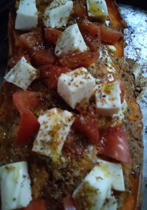 Una foto de Zapallo relleno vegetariano