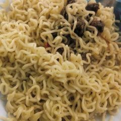 A picture of Beef with noodles.