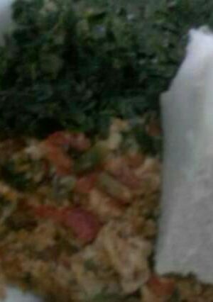 A picture of Fried eggs with vegges.