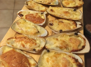 Una foto de Machas a la parmesana