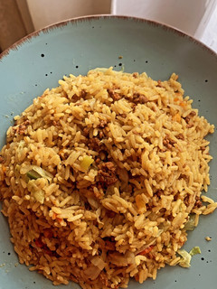 A picture of Oriental rice /minced meat rice.