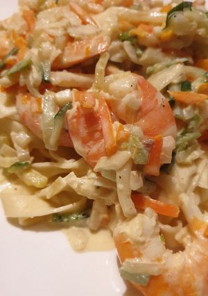 Une photo de Curry crevettes lait de coco petits légumes et pâtes fraîches