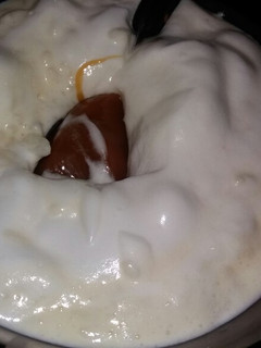 Una foto de Arroz con leche con yemada y merengue