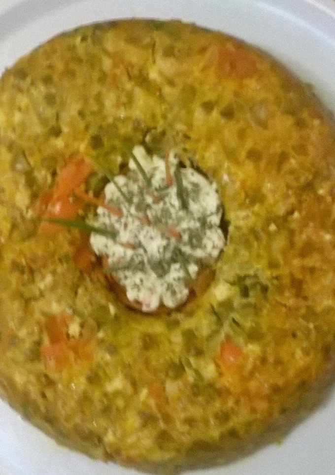 Una foto de Budín de verduras con salsa de queso y ciboulette