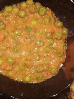 A picture of Garden peas in coconut curry.
