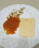 Dulce de quinotos con queso Pategrás y castañas de cajú
