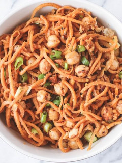 A picture of Sweet Potato Noodles with Almond Sauce.