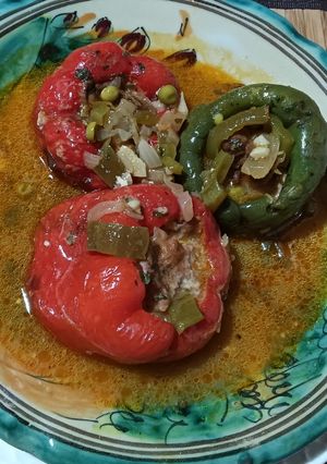 A picture of Stuffed Peppers with Ground Beef and Quail Eggs.