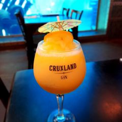 A picture of Ushaka Gin and orange Juice 🍊.