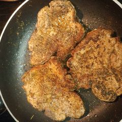 A picture of Sage Pork Chops with Preserve Sauce.