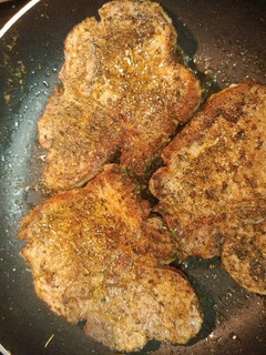 A picture of Sage Pork Chops with Preserve Sauce.