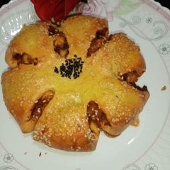 A picture of Masala fried chicken fillet stuffed bun in pateela.