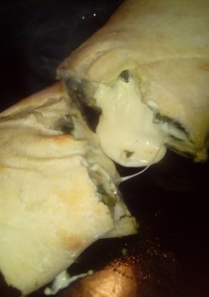 Una foto de Rollo de acelga y queso